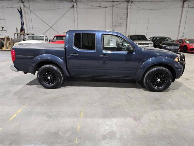 Photo of 2016 Arctic Blue Metallic Nissan Frontier