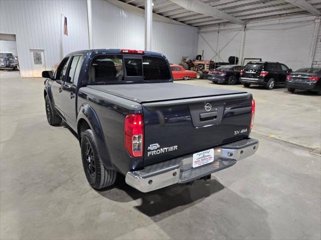 Photo of 2016 Arctic Blue Metallic Nissan Frontier
