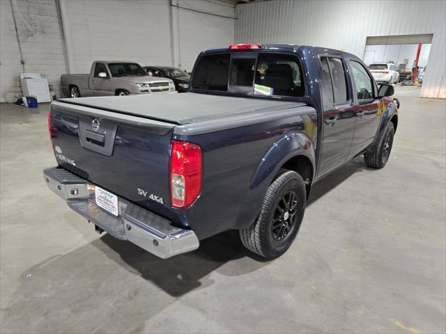 Photo of 2016 Arctic Blue Metallic Nissan Frontier
