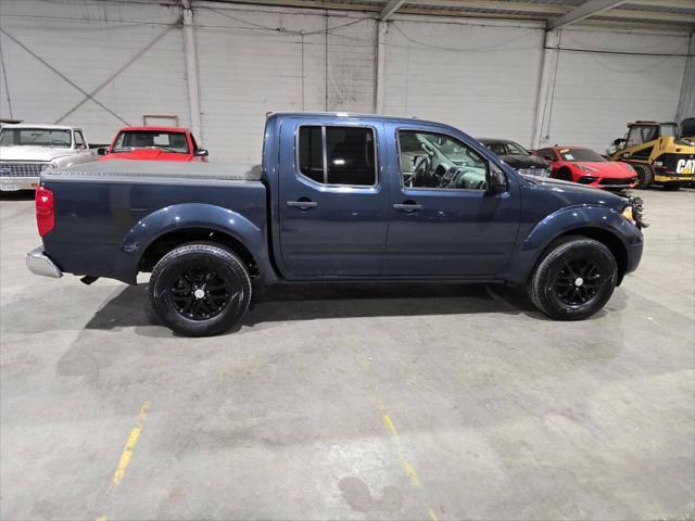 Photo of 2016 Arctic Blue Metallic Nissan Frontier