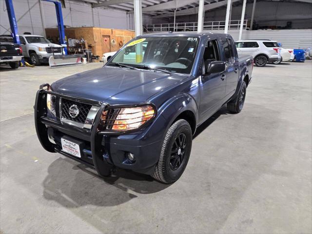 Photo of 2016 Arctic Blue Metallic Nissan Frontier