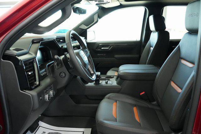 Photo of 2026 Volcanic Red Tintcoat GMC Sierra 1500
