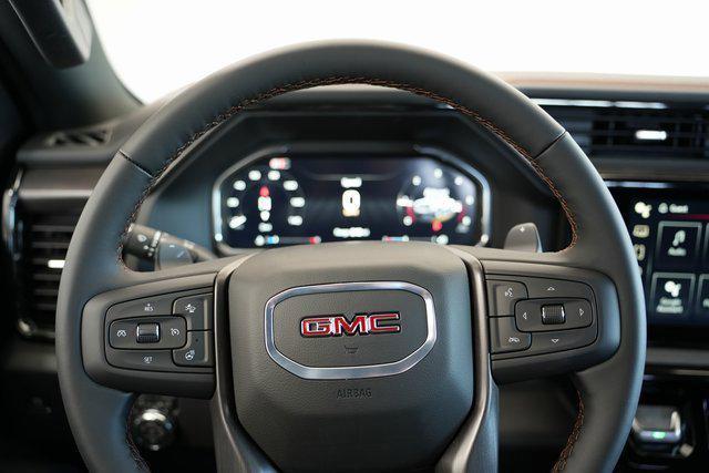 Photo of 2026 Volcanic Red Tintcoat GMC Sierra 1500