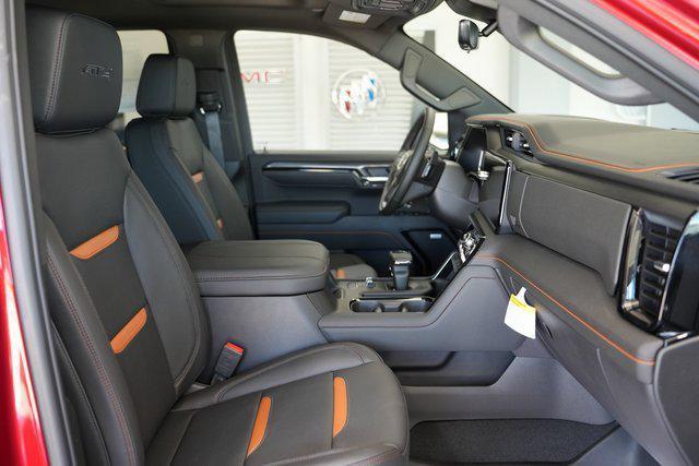 Photo of 2026 Volcanic Red Tintcoat GMC Sierra 1500