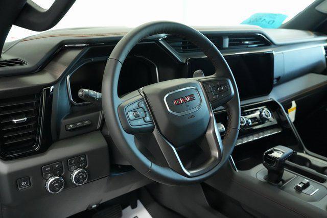 Photo of 2026 Volcanic Red Tintcoat GMC Sierra 1500