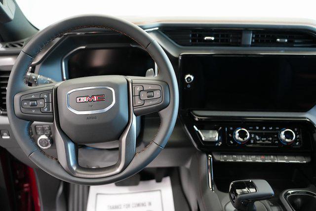 Photo of 2026 Volcanic Red Tintcoat GMC Sierra 1500