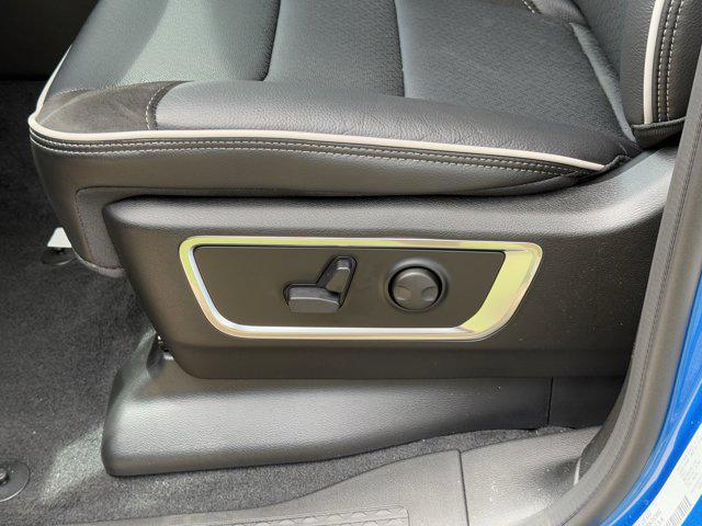 Photo of 2025 Hydro Blue Pearlcoat RAM 1500