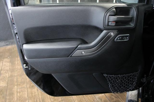 Photo of 2013 Black Clearcoat Jeep Wrangler Unlimited