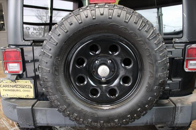 Photo of 2013 Black Clearcoat Jeep Wrangler Unlimited