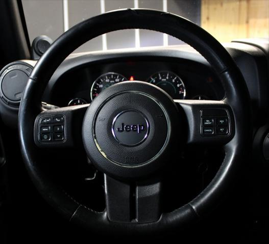 Photo of 2013 Black Clearcoat Jeep Wrangler Unlimited