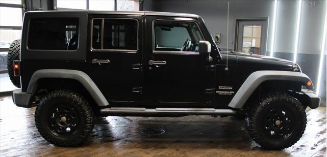 Photo of 2013 Black Clearcoat Jeep Wrangler Unlimited