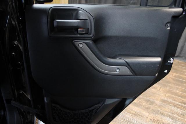Photo of 2013 Black Clearcoat Jeep Wrangler Unlimited