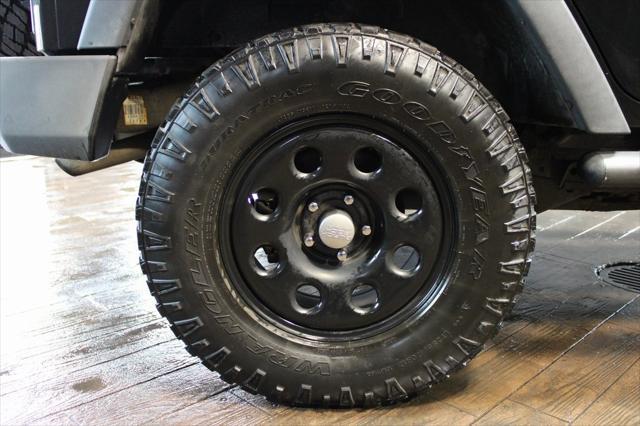 Photo of 2013 Black Clearcoat Jeep Wrangler Unlimited