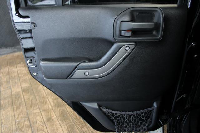 Photo of 2013 Black Clearcoat Jeep Wrangler Unlimited