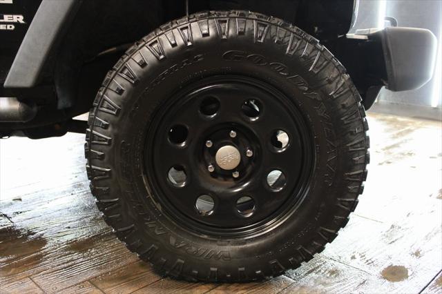 Photo of 2013 Black Clearcoat Jeep Wrangler Unlimited