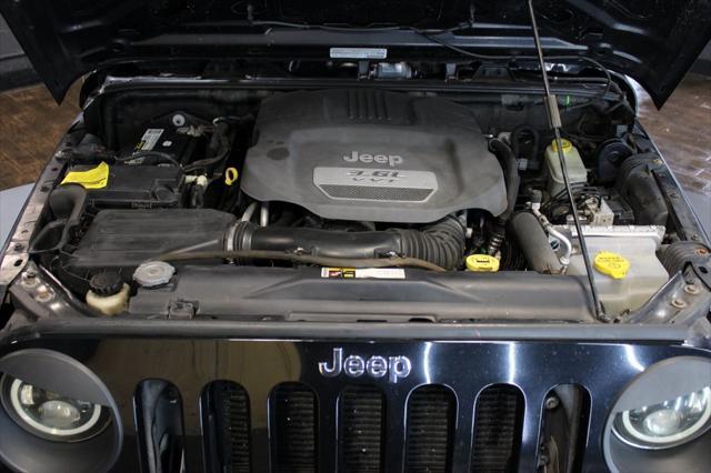 Photo of 2013 Black Clearcoat Jeep Wrangler Unlimited