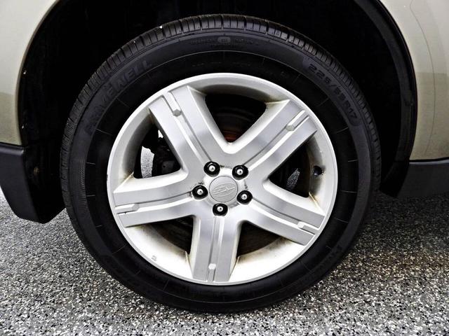 Photo of 2009 Tan Subaru Forester