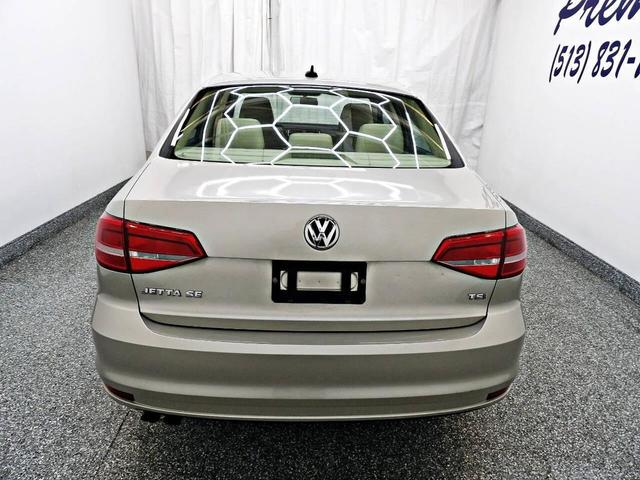 Photo of 2015 Tan Volkswagen Jetta