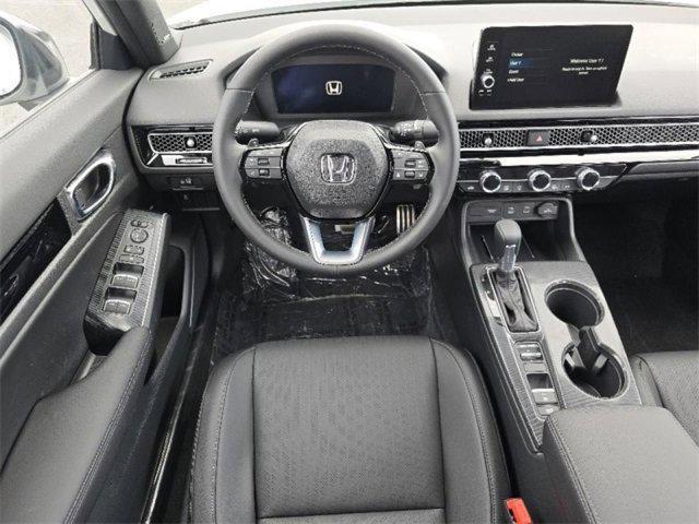 Photo of 2025 Urban Gray Pearl Honda Civic Hybrid