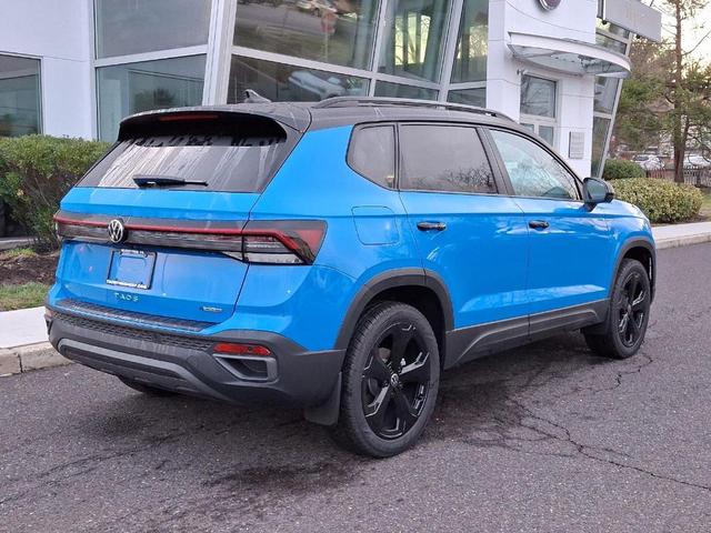 Photo of 2025 Cornflower Blue W/Black Roof Volkswagen Taos