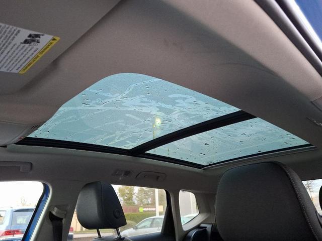 Photo of 2025 Cornflower Blue W/Black Roof Volkswagen Taos