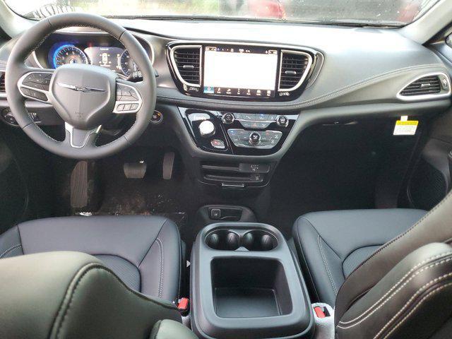 Photo of 2026 Bright White Clearcoat Chrysler Pacifica