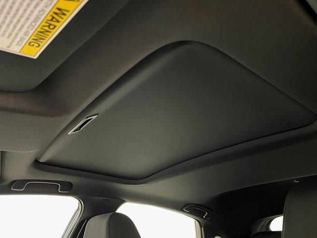 Photo of 2025 Boost Blue Pearl Honda Civic Hybrid