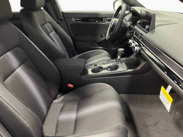 Photo of 2025 Boost Blue Pearl Honda Civic Hybrid