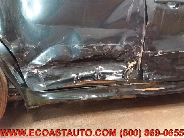 Photo of 2010 Atlantis Green Metallic Mercury Milan