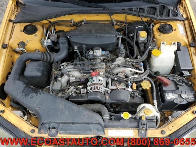Photo of 2003 Yellow Subaru Baja