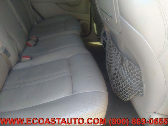 Photo of 2011 Crystal Red Tintcoat Cadillac SRX