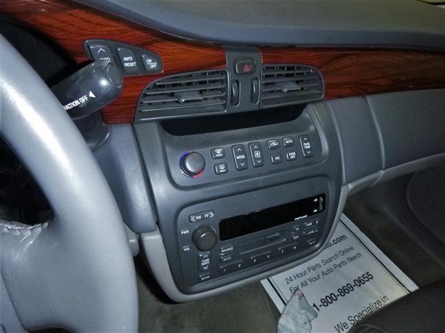 Photo of 2000 Polo Green Cadillac DeVille