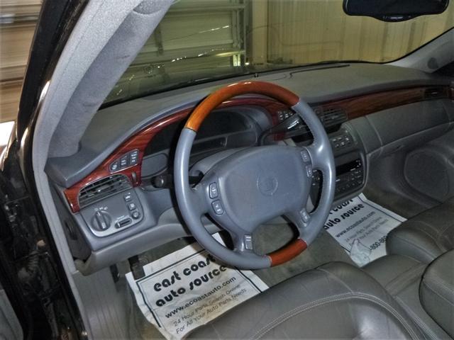 Photo of 2000 Polo Green Cadillac DeVille