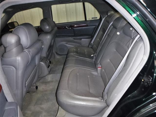 Photo of 2000 Polo Green Cadillac DeVille