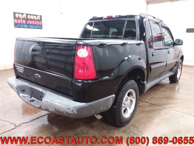 Photo of 2004 Black Ford Explorer Sport Trac