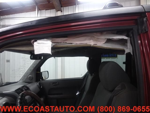 Photo of 2009 Tango Red Pearl Honda Element