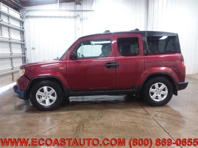 Photo of 2009 Tango Red Pearl Honda Element
