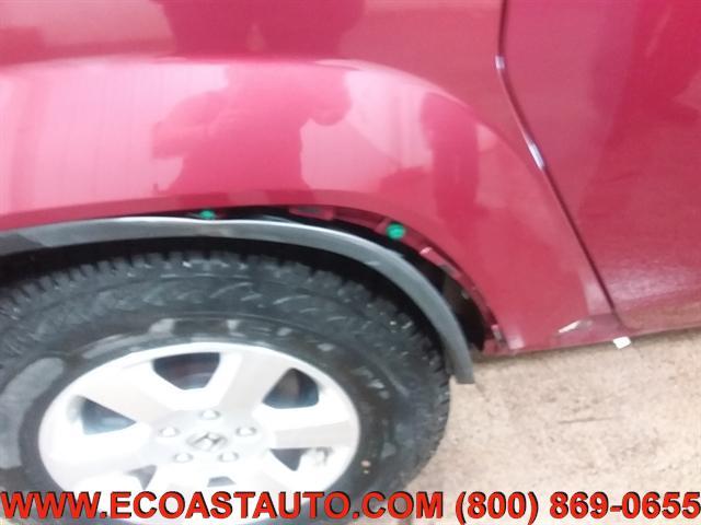 Photo of 2009 Tango Red Pearl Honda Element