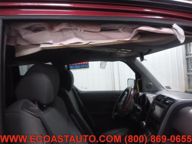 Photo of 2009 Tango Red Pearl Honda Element