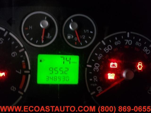 Photo of 2010 Frozen White Ford Transit Connect