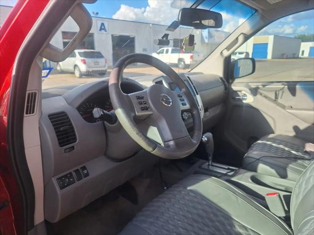 Photo of 2016 Lava Red Nissan Frontier