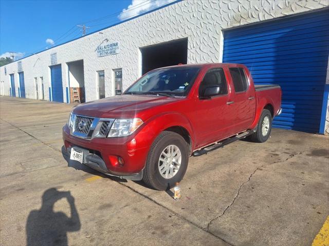 Photo of 2016 Lava Red Nissan Frontier