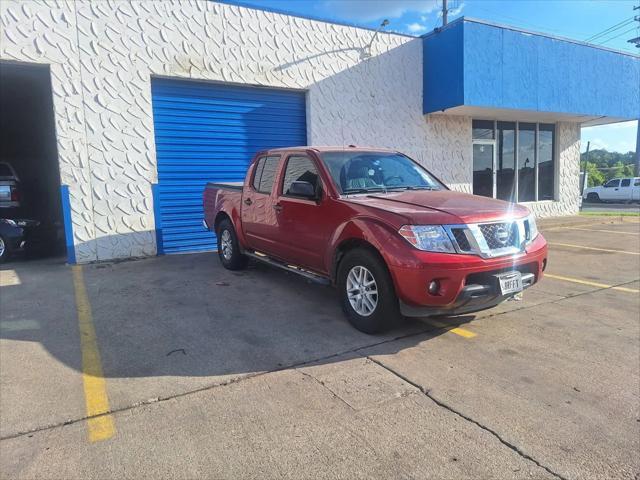 Photo of 2016 Lava Red Nissan Frontier