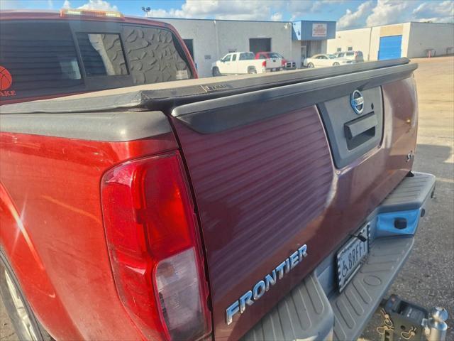 Photo of 2016 Lava Red Nissan Frontier