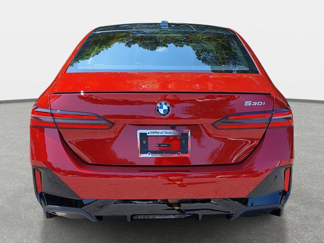 Photo of 2026 Vegas Red Metallic BMW 530