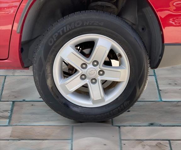 Photo of 2009 Volcanic Red Kia Sportage