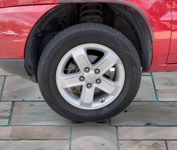 Photo of 2009 Volcanic Red Kia Sportage