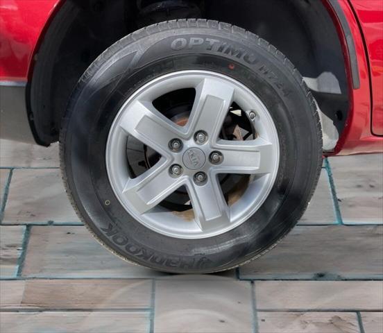 Photo of 2009 Volcanic Red Kia Sportage