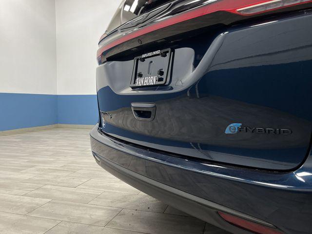 Photo of 2022 Fathom Blue Pearlcoat Chrysler Pacifica Hybrid