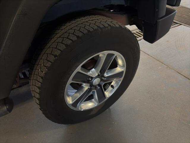 Photo of 2011 Black Clearcoat Jeep Wrangler Unlimited
